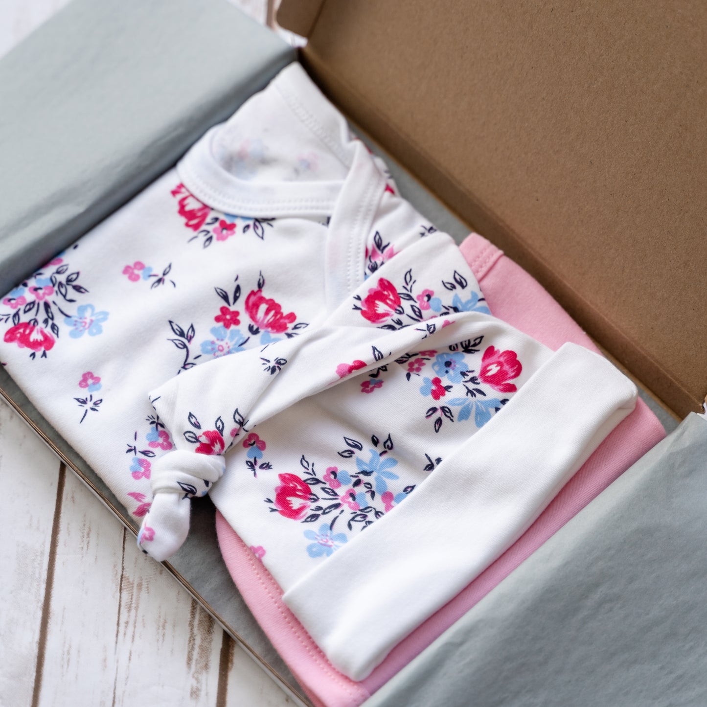 Newborn Floral Letterbox Set - Hat, Vest, Bib (Pink/Blue/White Floral)